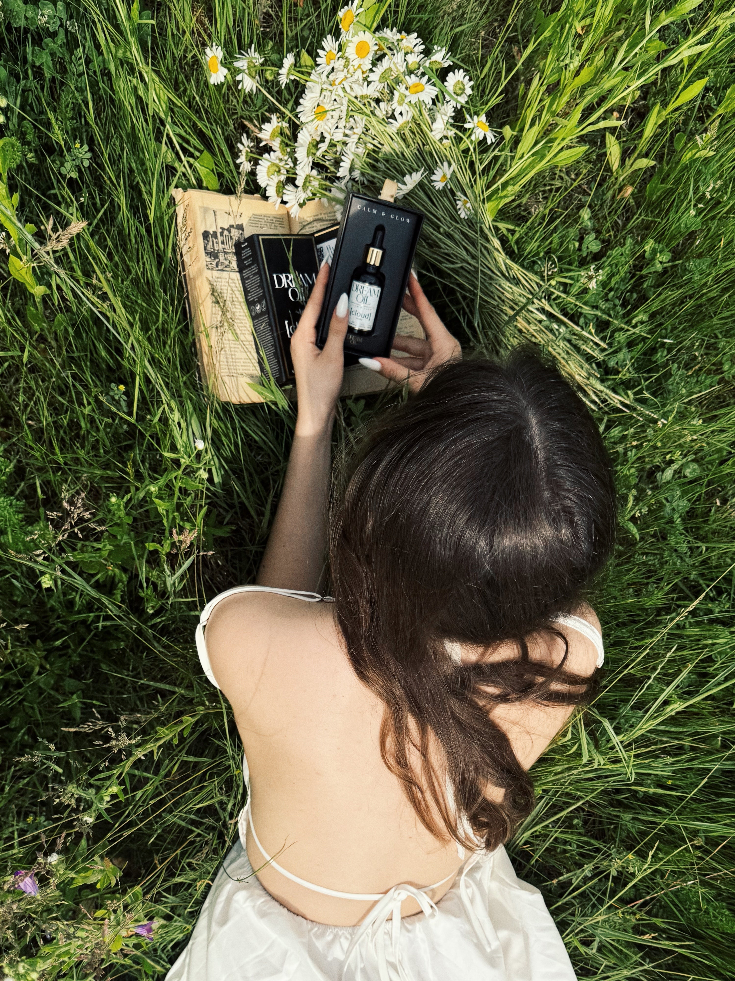 Dream Oil in the grass with a model